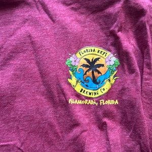 Men’s size L tee shirt.